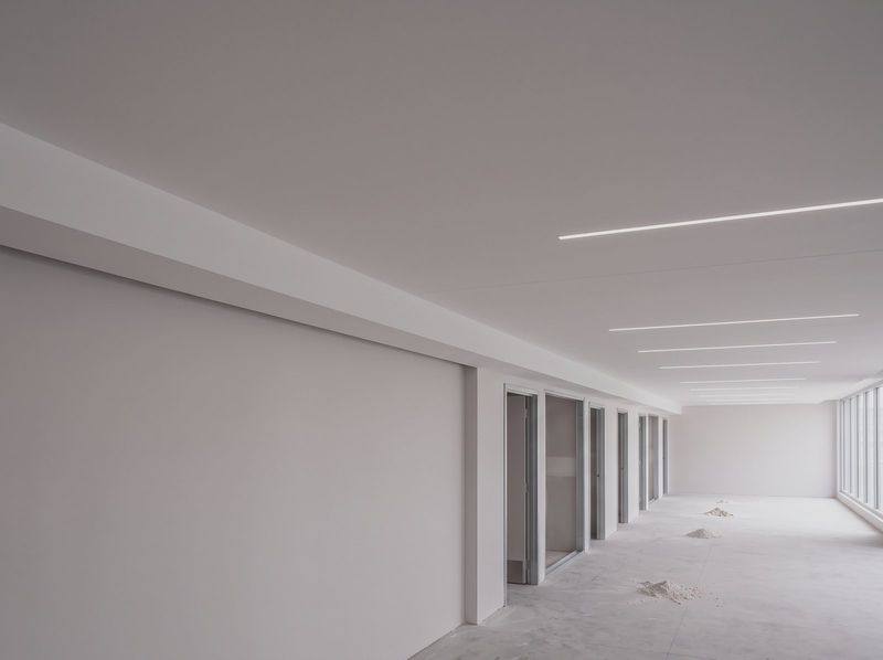 Suspended plasterboard ceiling and bulkhead in a completed commercial fitout
