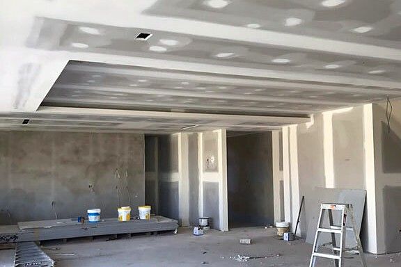 New plasterboard walls and bulkhead ceiling in a residential extension